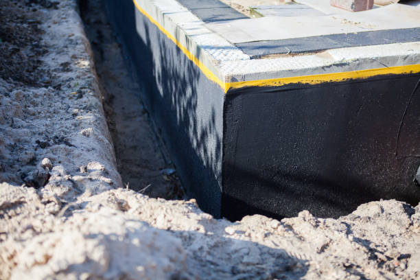 Professional Basement Waterproofing technician working in Stevenson, AL